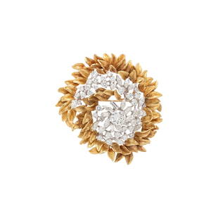 BICOLOR GOLD AND DIAMOND CONVERTIBLE BROOCH: BICOLOR GOLD AND DIAMOND CONVERTIBLE BROOCH Consisting of a white gold brooch containing one round brilliant cut diamond weighing 1.67 carats and 22 baguette, marquise and round brilliant cut