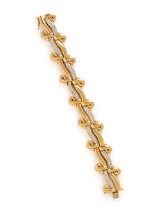 YELLOW GOLD, PLATINUM AND DIAMOND BRACELET: YELLOW GOLD, PLATINUM AND DIAMOND BRACELET Fancy links measuring approximately 10.00-20.00 mm, with round brilliant cut diamonds weighing approximately 1.25 carats total. 7 1/4 inches long. Stamp: