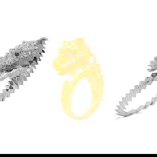 YELLOW GOLD, DIAMOND AND MULTIGEM LEOPARD RING: YELLOW GOLD, DIAMOND AND MULTIGEM LEOPARD RING In a by-pass design, with round brilliant cut diamonds, round mixed cut sapphire spots and ruby eyes. Ring size 8 1/4. Stamp: 750. Gross weight: 12.20