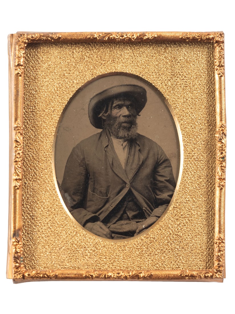 [EARLY PHOTOGRAPHY]. Sixth plate tintype portrait of a Black man wearing a large hat. (1 of 2)