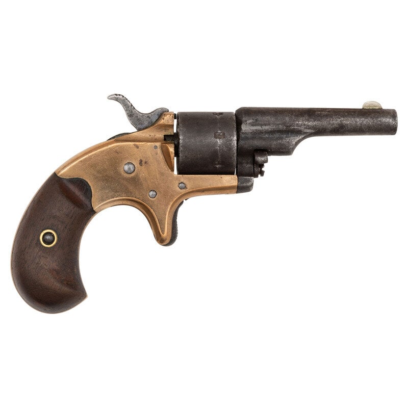 Colt Old Line Open Top Revolver in .22 RF: Colt Old Line Open Top Revolver in .22 RF Manufactured 1874 .22 RF. 2.375" barrel length. SN: 40626. Brass finish to frame, blued metal finish to barrel and cylinder. Grips are smooth walnut bird's he