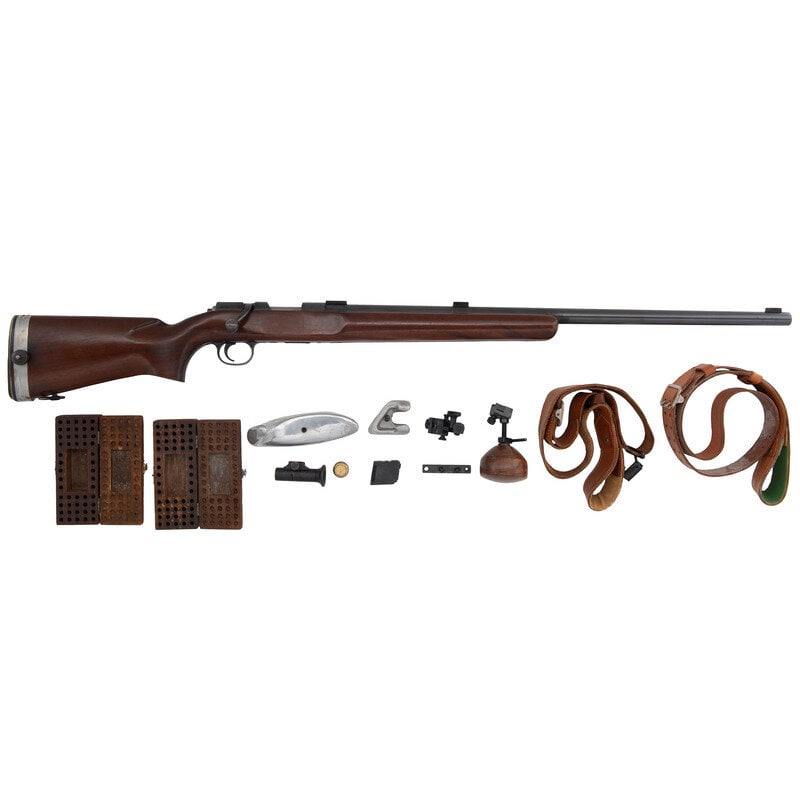 **Remington Model 37 Rangemaster Bench Rifle with Accessories: **Remington Model 37 Rangemaster Bench Rifle with Accessories .22 LR. 28" barrel length. SN: 08010. Blued metal finish with polished bolt set in a walnut semi0pistol grip stock with forend fitted with