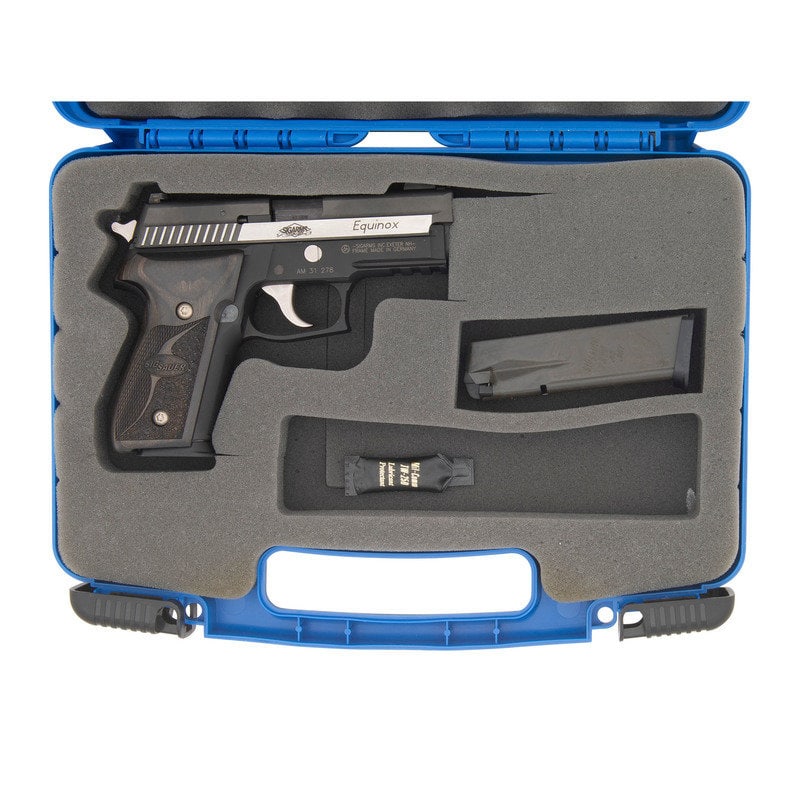 *Sig Sauer P229 SigArms Custom Shop Equinox in Box with Accessories: *Sig Sauer P229 SigArms Custom Shop Equinox in Box with Accessories .40 S&W. 3.9" barrel length. SN: AM31278. Black Nitron finish to the rounds of the slide with polished finish to the flats and s