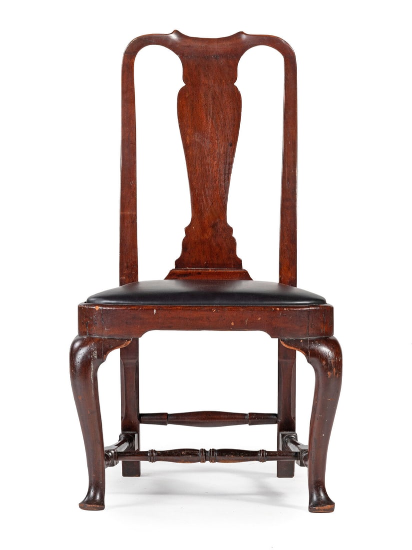 A Queen Anne Carved Walnut Compass-Seat Stretcher-Base Side Chair: A Queen Anne Carved Walnut Compass-Seat Stretcher-Base Side Chair Boston, Massachusetts, Circa 1750 seat rail marked VI, slip seat is replaced. Height 37 3/4 inches.
