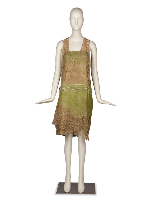 Stein & Blaine Dress, 1926 : Stein & Blaine Dress, 1926 Sleeveless, knee-length dress in metal thread-embellished green silk and lace. Dress features horizontal crystal embellishment overlays around hips with a crystal bow