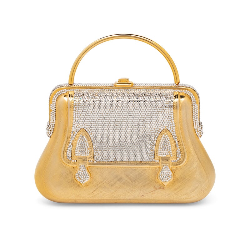 Judith Leiber Top Handle Minaudière: Judith Leiber Top Handle Minaudière Top-handle minaudière in brushed, gold-tone metal with crystal embellishments throughout. Bag features push-lock clasp closure, a retractable chain shoul
