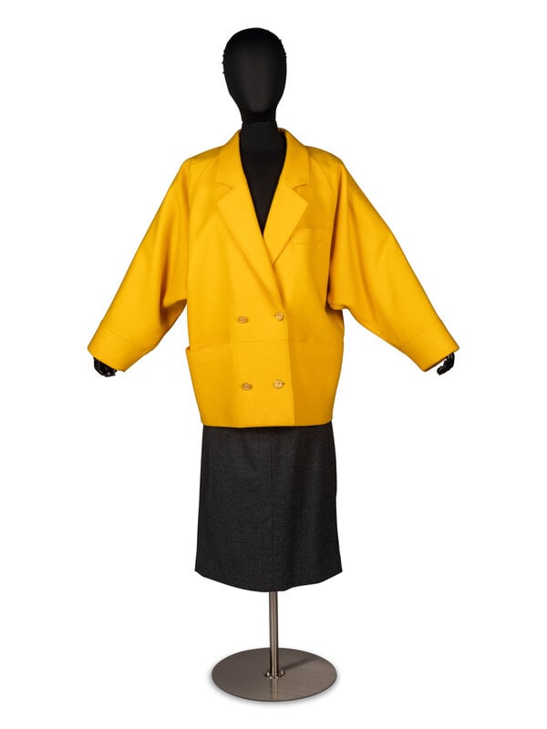 Guy Laroche Jacket and Hermès Skirt: Guy Laroche Jacket and Hermès Skirt THE FIRST Wide, dropped-sleeve, double-breasted jacket in yellow wool. Jacket features notched collar, gold-tone metal buttons, full-lining, and two exteri