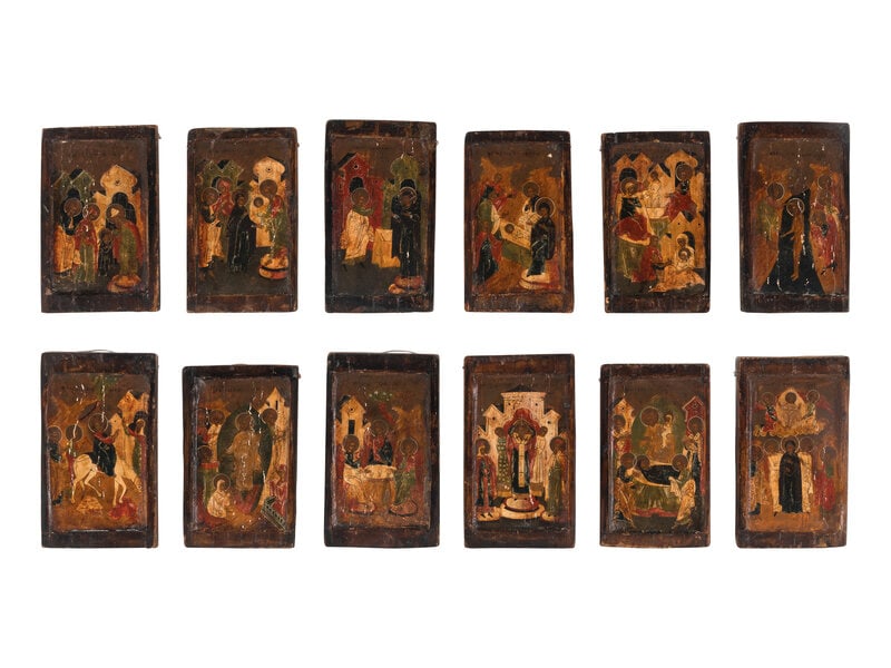 A Set of Twelve Polychrome Painted Russian Icons (1 of 4)