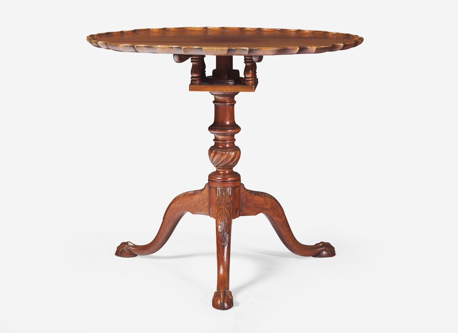 A Chippendale style mahogany tilt-top tea table, 20th century (1 of 2)