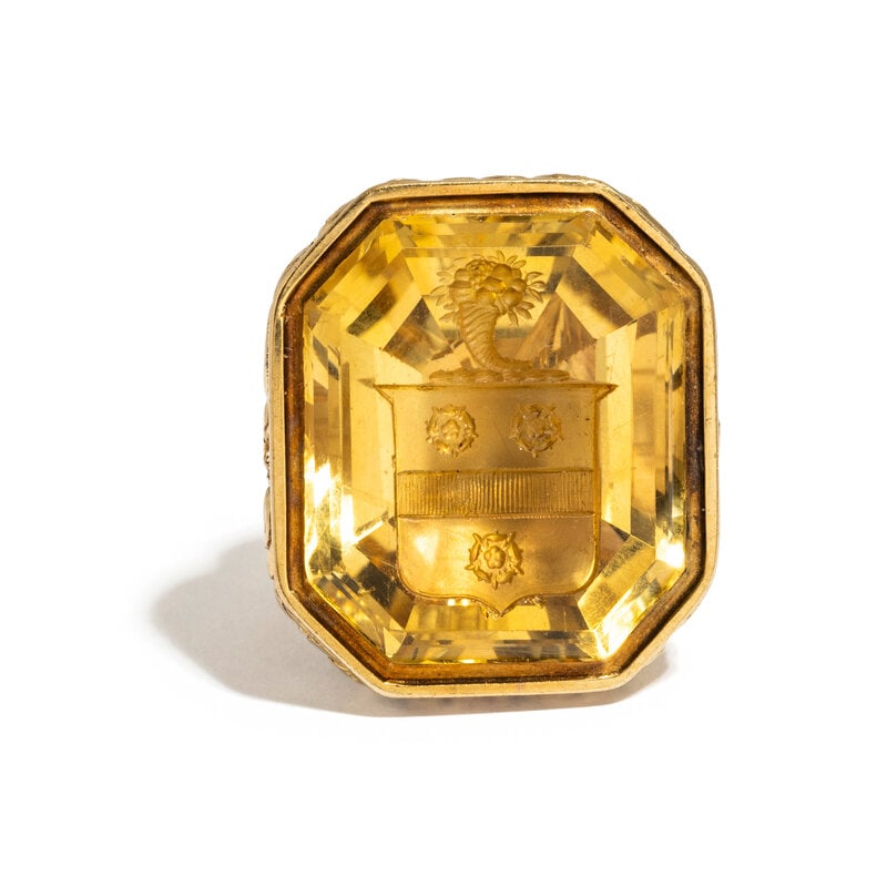 YELLOW GOLD AND CITRINE FOB: YELLOW GOLD AND CITRINE FOB Citrine intaglio seal. Yellow gold. 1 1/2 inches long. Gross weight: 19.00 dwt. This lot is located in Chicago. Property from the Collection of Janet J
