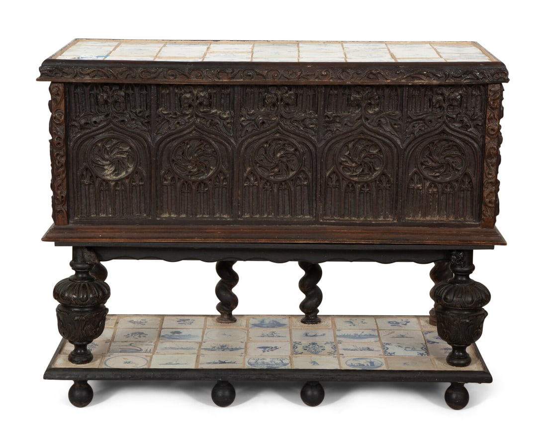 A Gothic Revival Carved Oak Tile-Mounted Chest on Stand (1 of 5)