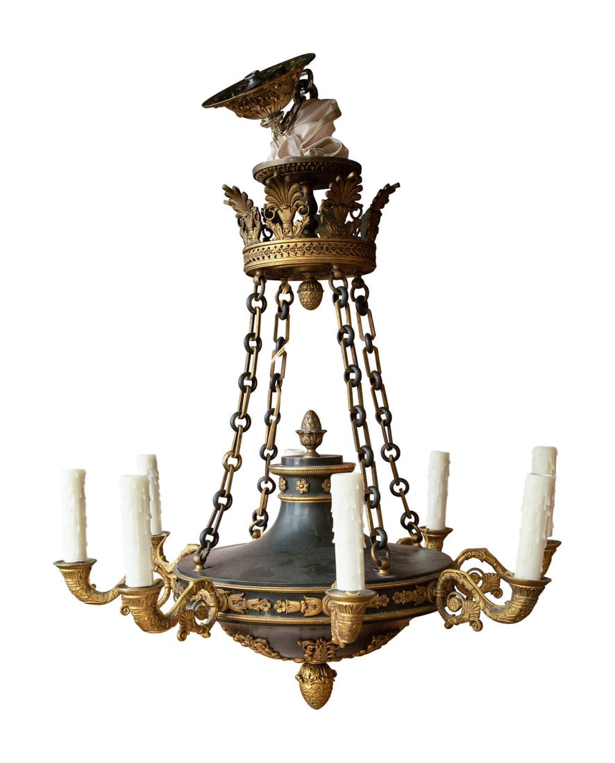 An Empire Style Patinated and Gilt Bronze Eight-Light Chandelier: An Empire Style Patinated and Gilt Bronze Eight-Light Chandelier 20th Century Height 25 x diameter 26 inches.