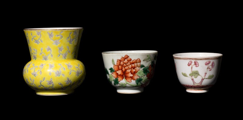 Three Chinese Famille Rose Porcelain Wares: Three Chinese Famille Rose Porcelain Wares Late Qing Dynasty comprising a yellow ground grisaille enameled spittoon painted with floral sprigs, two wine cups each decorated with floral blossoms.