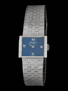 PATEK PHILIPPE, 18K WHITE GOLD WATCH: PATEK PHILIPPE, 18K WHITE GOLD WATCH Maker: Patek Philippe Case size: Approx. 20 mm Case material: 18K white gold with personalized engraving Dial: Blue Movement: Manual wind Bracelet/Strap: