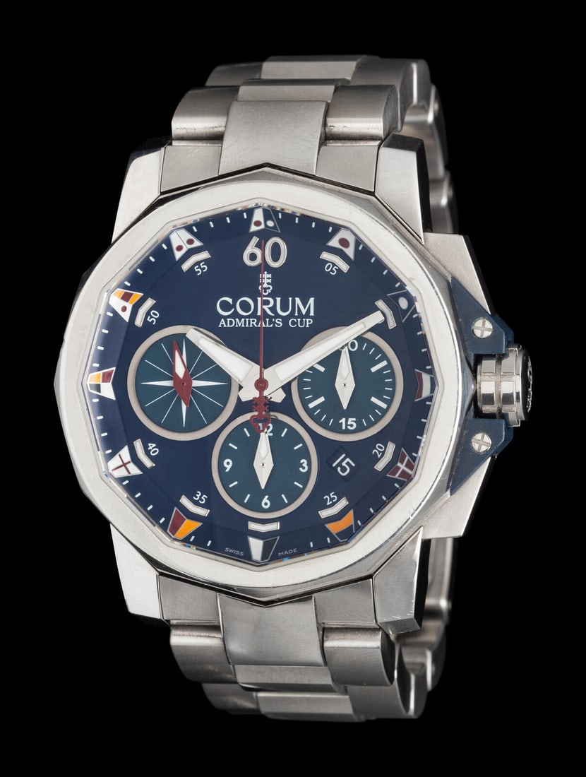CORUM, STAINLESS STEEL 'ADMIRAL'S CUP' WATCH: CORUM, STAINLESS STEEL 'ADMIRAL'S CUP' WATCH Maker: Corum Model: Admiral's Cup Case size: Approx. 44 mm Case material: Stainless steel Dial: Blue with enamel nautical flags Movement: Automatic Bracele