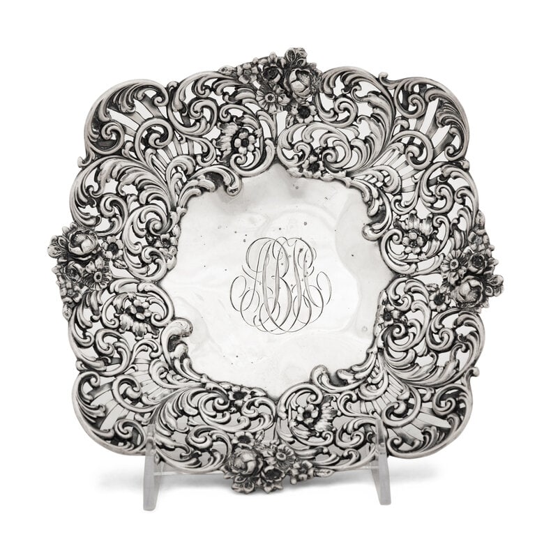 An American Silver Reticulated Bowl Raised on Ball Feet: An American Silver Reticulated Bowl Raised on Ball Feet Black, Starr and Frost, New York monogrammed. hallmarked for sterling, 3406 5 ozt 10 dwt Height 2 1/4 x diameter 8 1/4 inches.