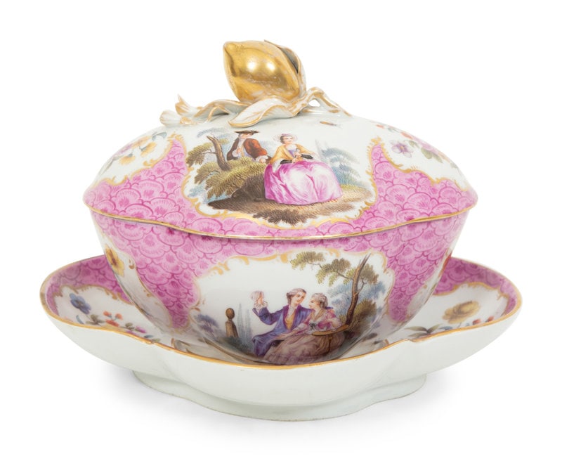 A Meissen Porcelain Sauce Tureen with Undertray: A Meissen Porcelain Sauce Tureen with Undertray Circa 1865 polychrome painted with scenes after Watteau and having a lemon knop. Height 6 1/2 x width 7 x depth 7 inches. This lot is located
