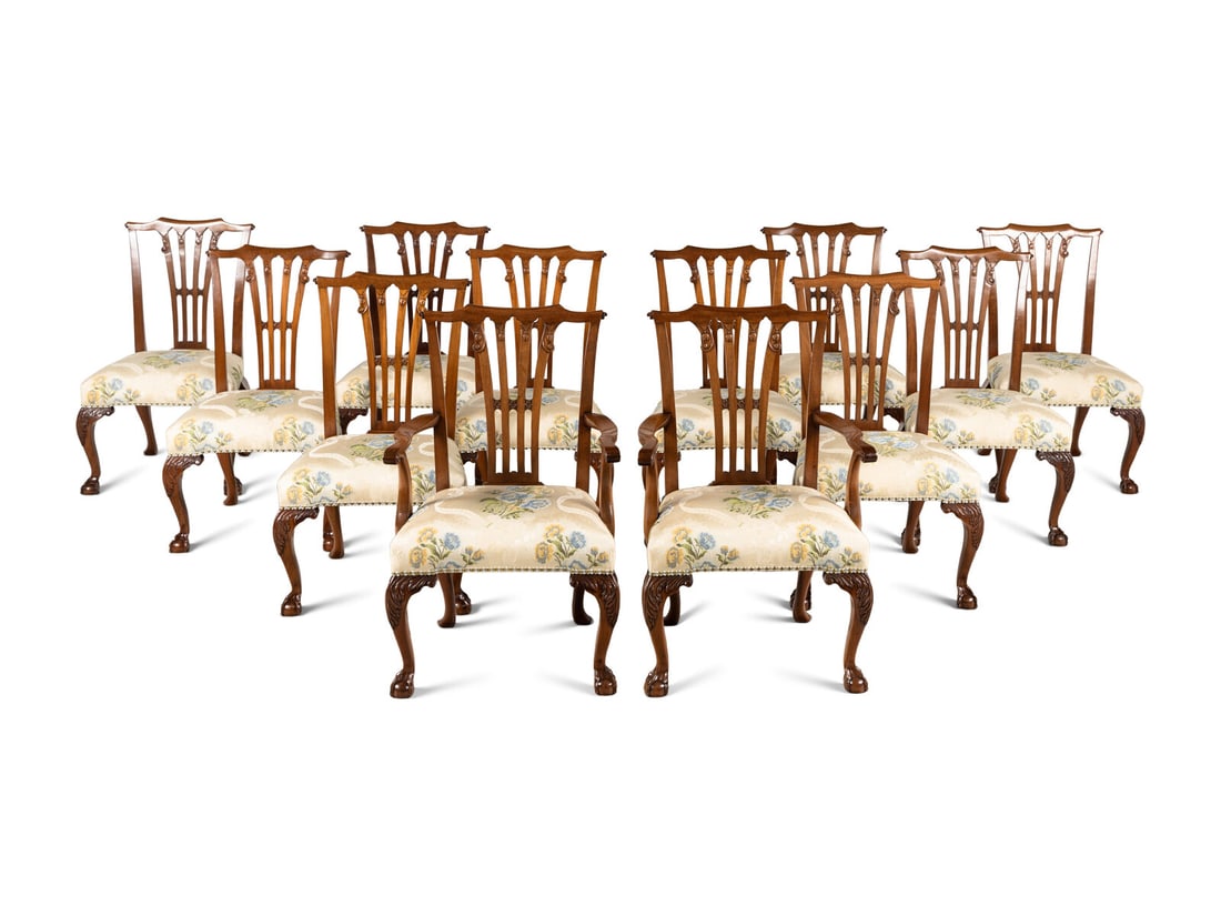 A Set of Twelve George III Style Mahogany Dining Chairs: A Set of Twelve George III Style Mahogany Dining Chairs 20th Century comprising ten side chairs and two armchairs. Height of side chairs 40 x width 24 x depth 23 inches; height armchairs 40 x width 25