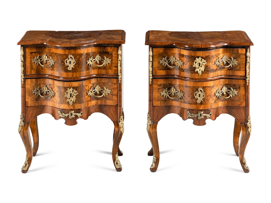 A Pair of Continental Gilt Metal Mounted Burlwood Commodes: A Pair of Continental Gilt Metal Mounted Burlwood Commodes 20th Century Height 29 x width 23 3/4 x depth 17 1/4 inches. This lot is located in Chicago.
