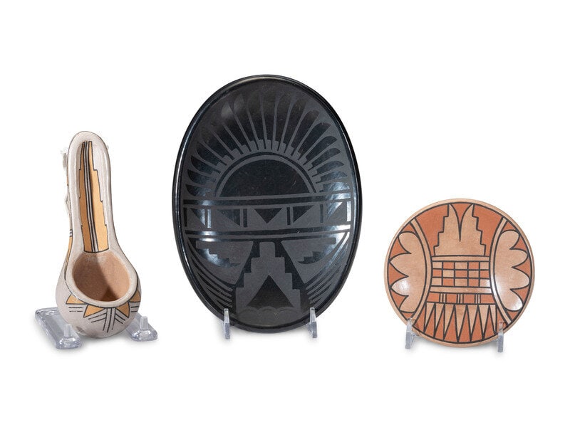 Crucita Calabaza, Blue Corn (San Ildefonso, 1921-1999) Blackware and Polychrome Pottery: Crucita Calabaza, Blue Corn (San Ildefonso, 1921-1999) Blackware and Polychrome Pottery lot of 3, includes: an oval plate designed with repeating feathers and other sky elements, signed on base length