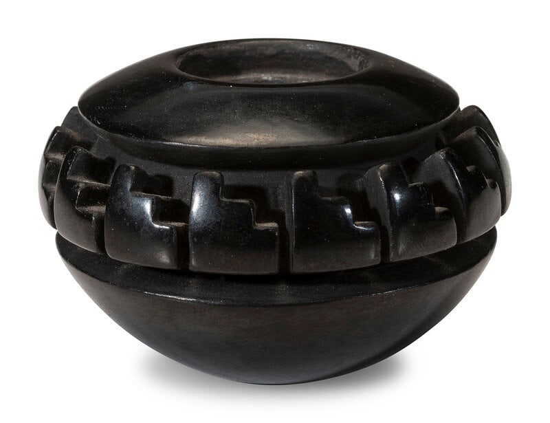 Nancy Youngblood (Santa Clara, b. 1955) Carved Miniature Blackware Pottery Jar: Nancy Youngblood (Santa Clara, b. 1955) Carved Miniature Blackware Pottery Jar deeply carved with stepped motif, signed on base height 1-1/2 inches x diameter 2 inches This lot is located in Cincinna