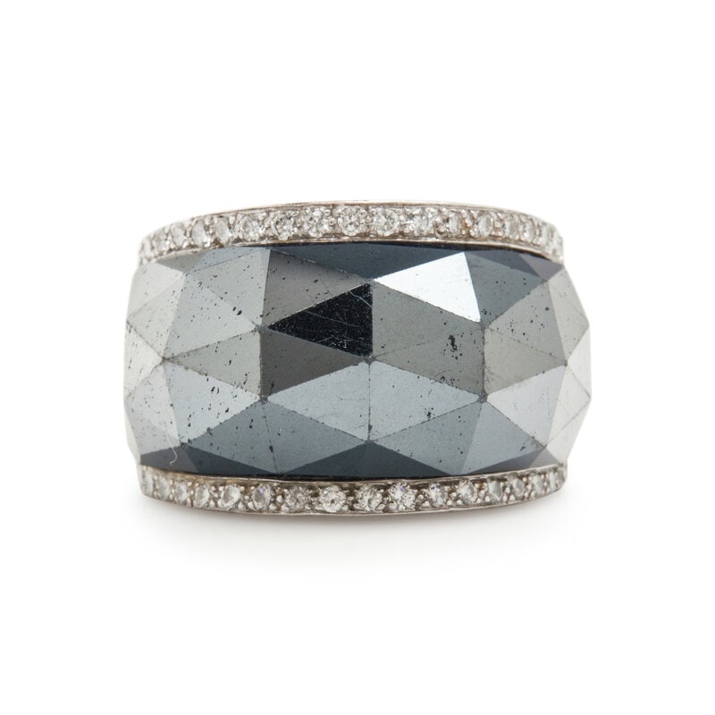 STEPHEN WEBSTER, WHITE GOLD, HEMATITE, AND DIAMOND RING: STEPHEN WEBSTER, WHITE GOLD, HEMATITE, AND DIAMOND RING Faceted hematite and quartz doublet with round brilliant cut diamond accents weighing approximately 0.63 carat total. 18 karat white gold. Ring