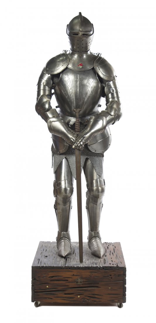 A Continental Full Suit of Armor, Height 70 inches: A Continental Full Suit of Armor, having engraved decoration to neck and breast plate, with long sword. Height 70 inches. Property from the Estate of Mr. Chester E. Zarr, Western Springs, Illinois