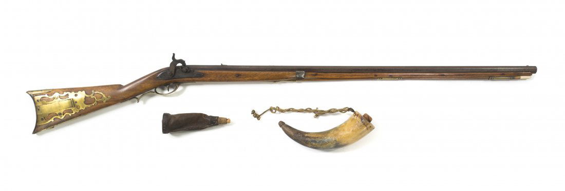 An American Percussion Cap Musket, R. Ashmore, Len: An American Percussion Cap Musket, R. Ashmore, mid-19th century, having an octagonal barrel and brass mounts, with a horn and a leather bullet bag. Length 50 1/2 inches. Property from the Collection o