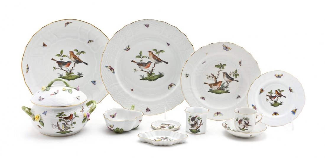 A Herend Porcelain Partial Dinner Service, Diamete: A Herend Porcelain Partial Dinner Service, in the Rothschild Bird pattern, comprising 18 dinner plates, 17 shallow bowls, a center bowl, 12 saucers, 12 smaller saucers, two covered serving bowls, one 