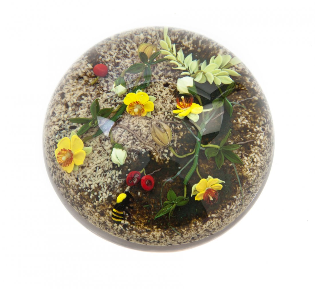 A Paul Joseph Stankard Mangum Environment Glass P: A Paul Joseph Stankard Mangum Environment Glass Paperweight, set with yellow flowers and a bumblebee on a sandy ground, signed S Cane, engraved A155 1983. Diameter 4 1/4 inches. Provenance: Sold: Soth