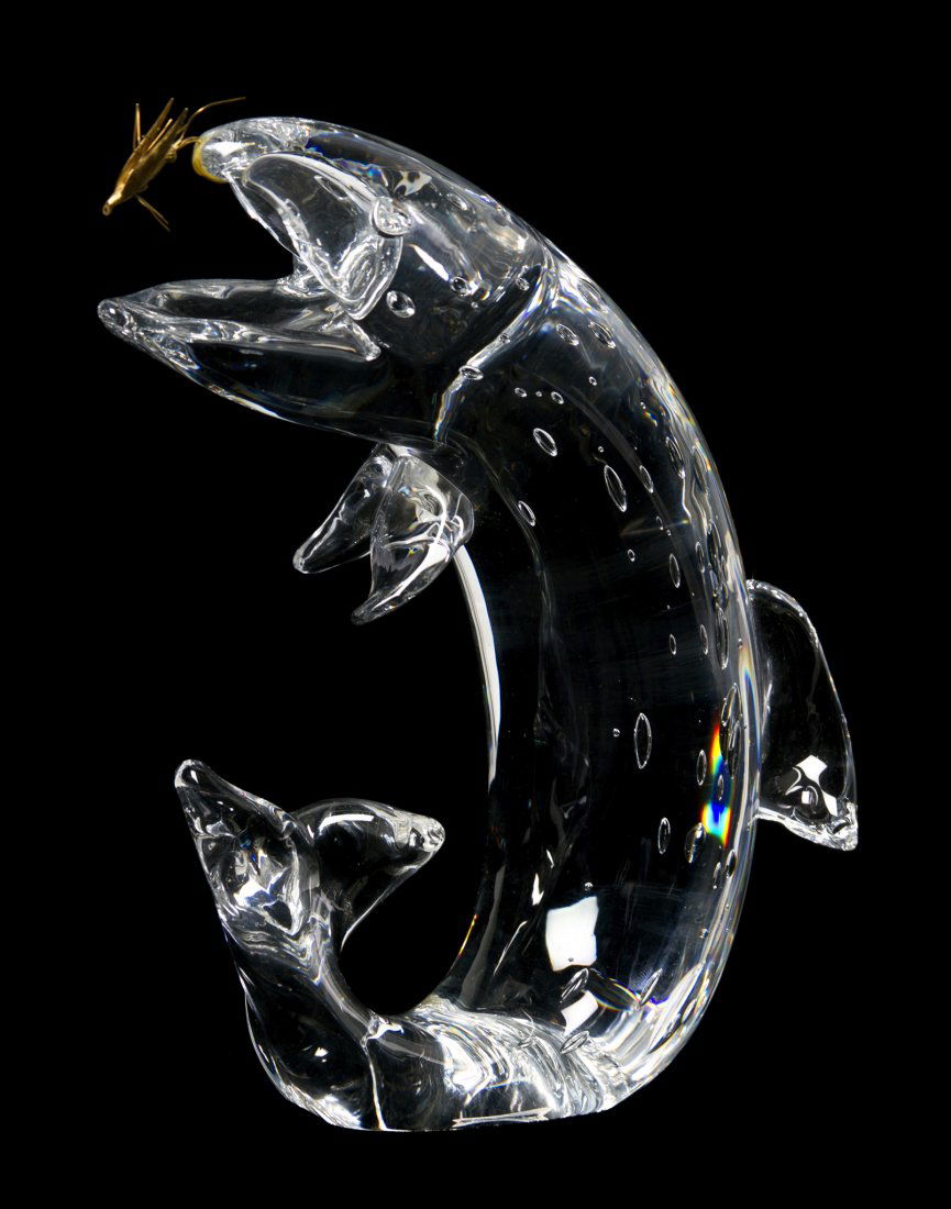 A Steuben Glass Sculpture, Height 8 1/4 inches.: A Steuben Glass Sculpture, Trout and Fly, designed by James Houston, 1966, having a 14K gold fly. Height 8 1/4 inches. Property from the Estate of Mr. and Mrs. Hugo Scherer Higbie, Grosse Pointe, Mich