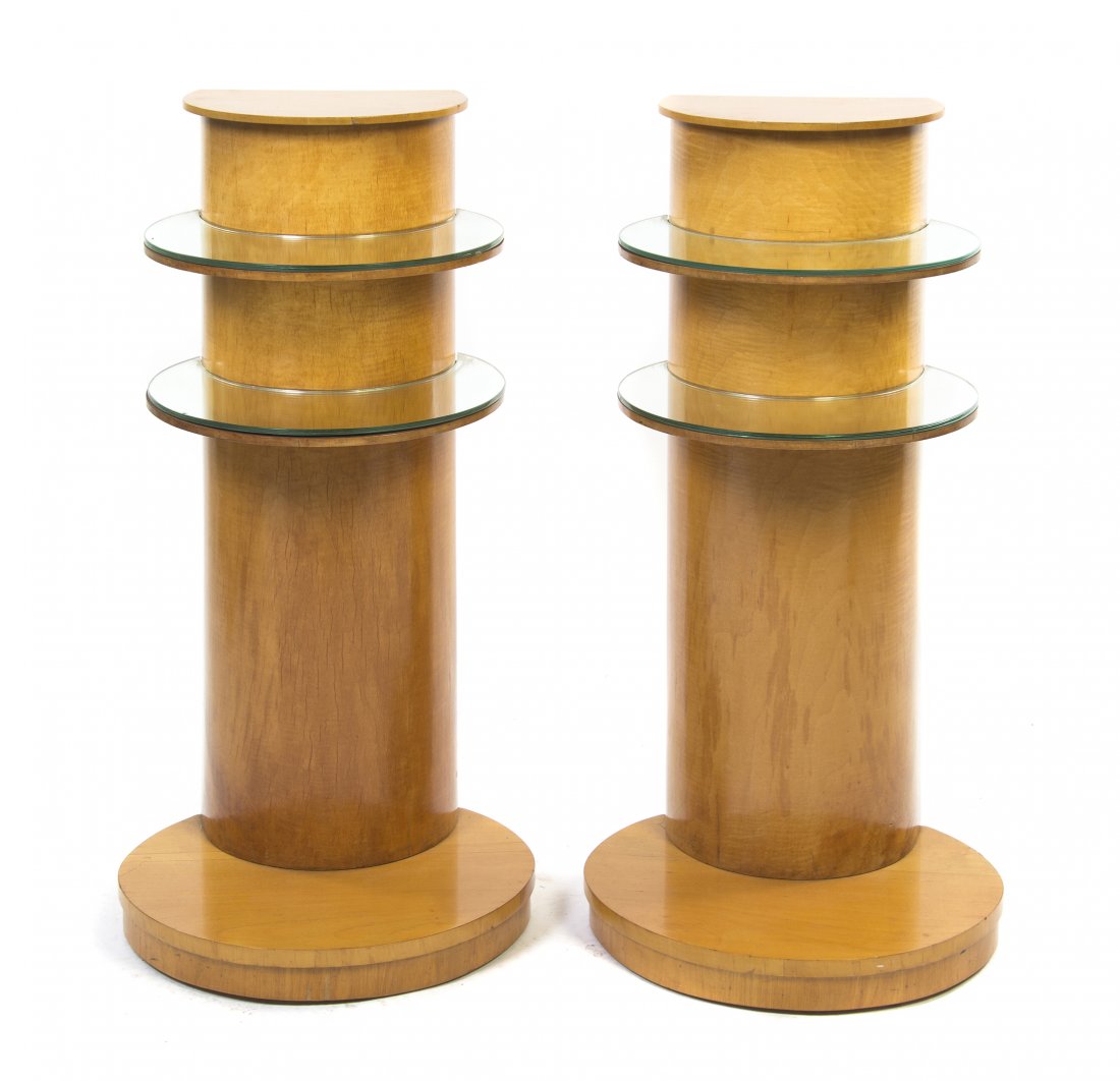 A Pair of English Art Deco Maple Side Tables, Hei: A Pair of English Art Deco Maple Side Tables, each of cylindrical form set with two projecting circular mirrored shelves, raised on a circular base. Height 34 3/4 x width 17 1/2 x depth 15 inches.