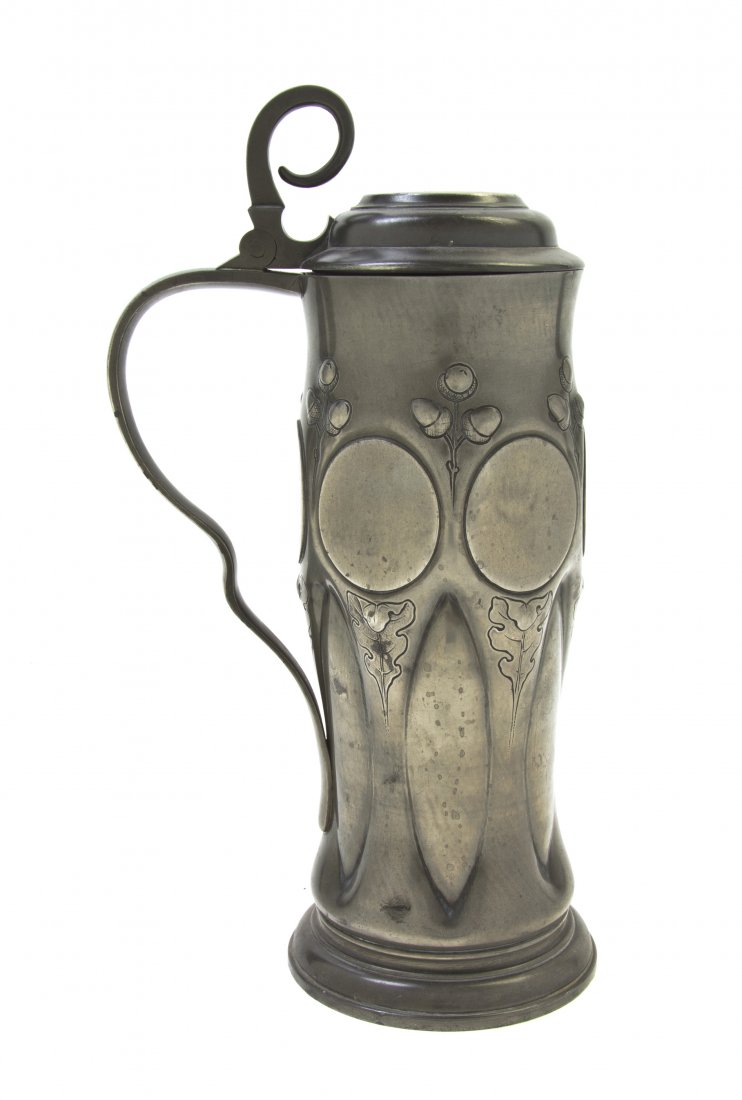A German Jugendstil Pewter Tankard, Height overal: A German Jugendstil Pewter Tankard, with acorn decoration, having figural L.L. mark. Height overall 14 1/4 inches. Property from the Estate of Charles P. Wood, Chicago, Illinois