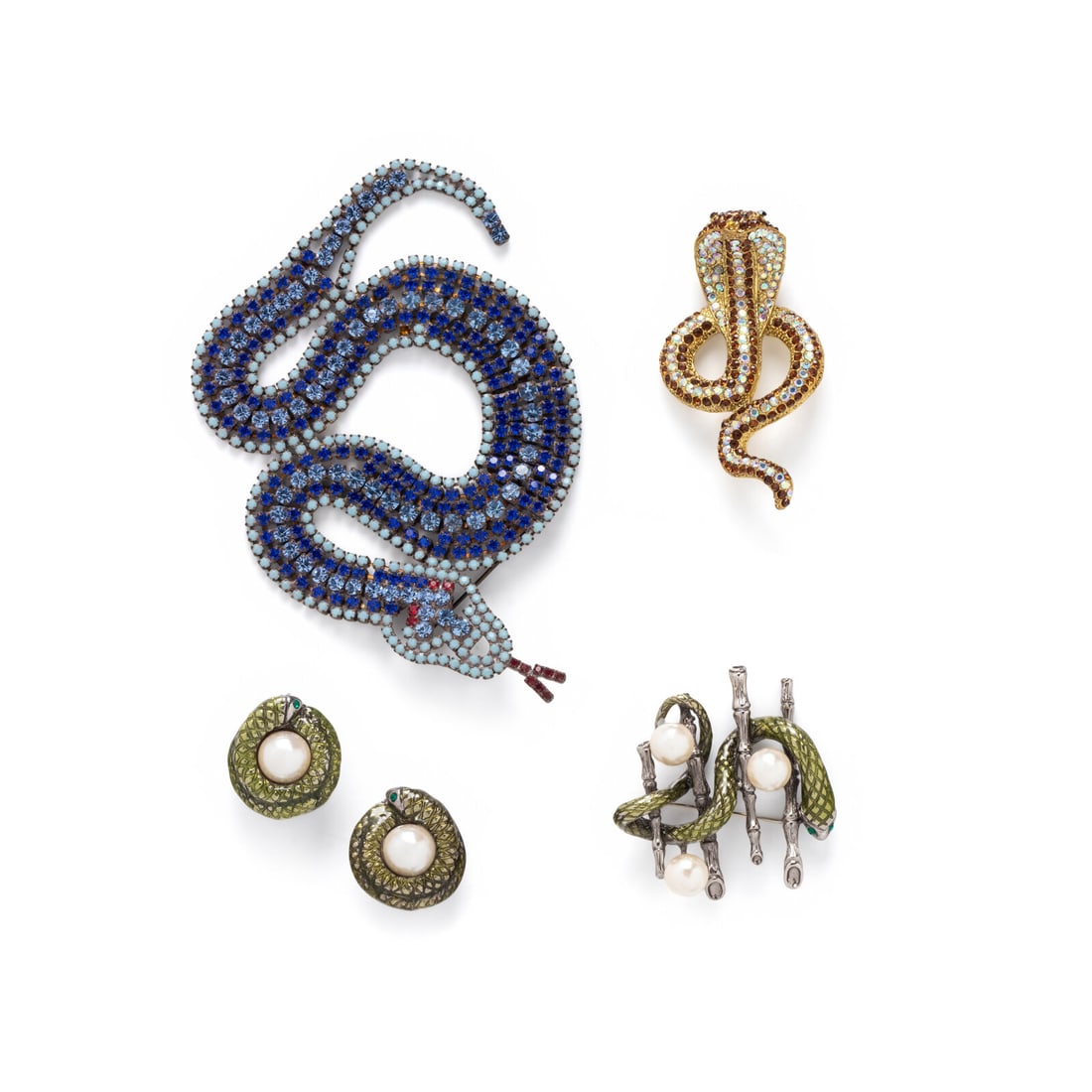 COLLECTION OF SNAKE MOTIF COSTUME JEWELRY: COLLECTION OF SNAKE MOTIF COSTUME JEWELRY Including an Erwin Pearl pin and clip earrings, a cobra pin, and Czech crystal snake pin. Snake pin stamp: E. PEARL. Earclips stamp: ERWIN PEARL. Snake stamp: