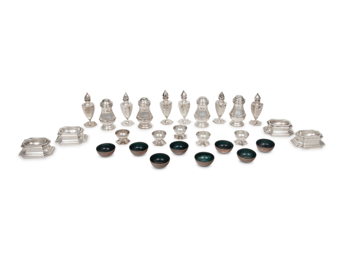 A Group of Sugar Shakers and Salt Cellars: A Group of Sugar Shakers and Salt Cellars Secretary Albright often entertained foreign leaders in her Washington D.C. home. She identified the silver sugar shakers in this lot as her favorite things: