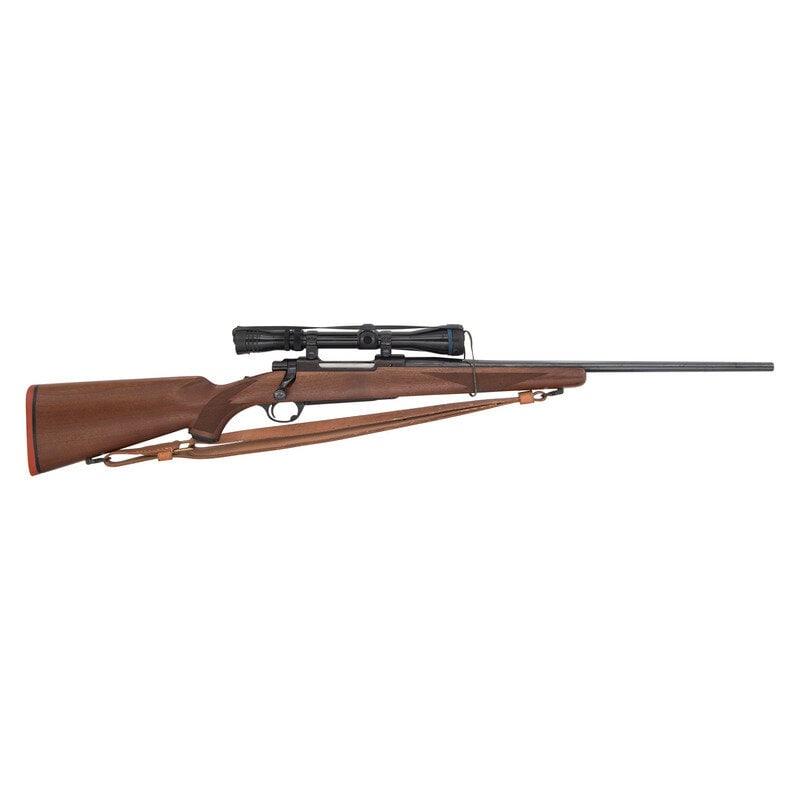 *Ruger M77 with Redfield Scope: *Ruger M77 with Redfield Scope .30-06 Springfield. 22" barrel length. SN: 71-16681. Blued metal finish. Walnut stock has checkering to semi pistol grip and forearm. Bolt action rifle with a Redfield 4