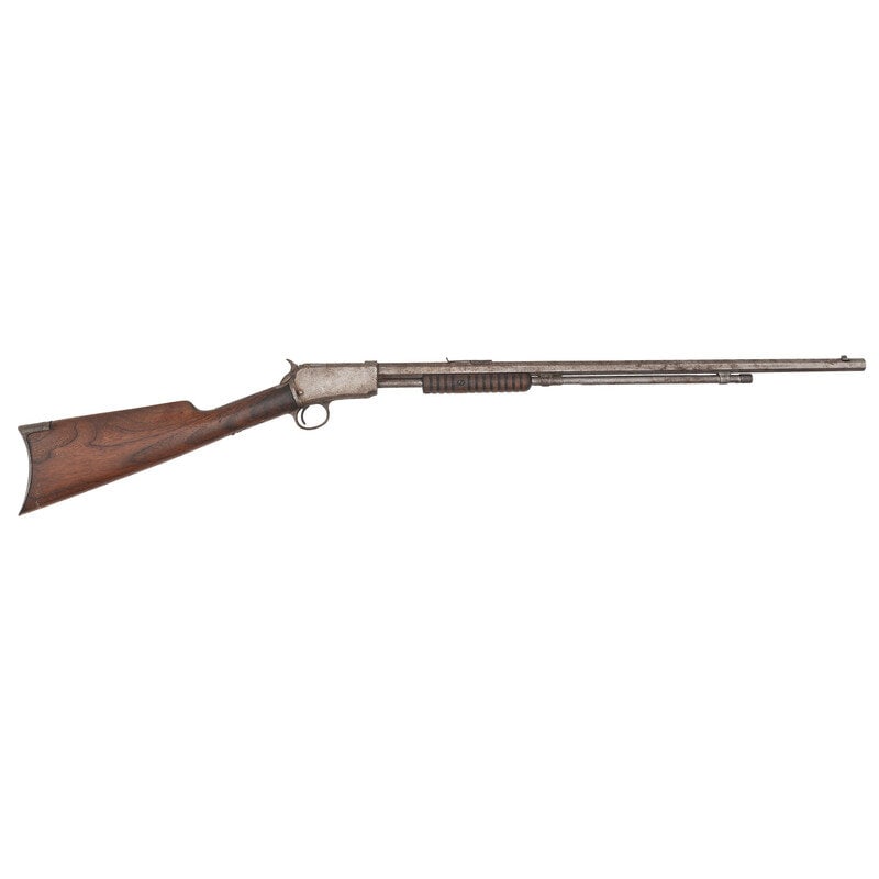 **Winchester Model 1890 Rifle in .22 Short: **Winchester Model 1890 Rifle in .22 Short .22 Short. 24" barrel length. SN: 264495. Buffed grey patina overall with straight walnut stock and corncob forend mounting dovetailed front blade and rear n