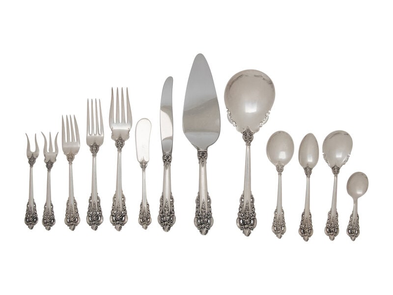 An American Silver Flatware Service: An American Silver Flatware Service Wallace Silversmiths, Wallingford, Connecticut, 20th Century Grand Baroque pattern, comprising: 12 dinner knives 10 dinner forks 12 salad forks 11