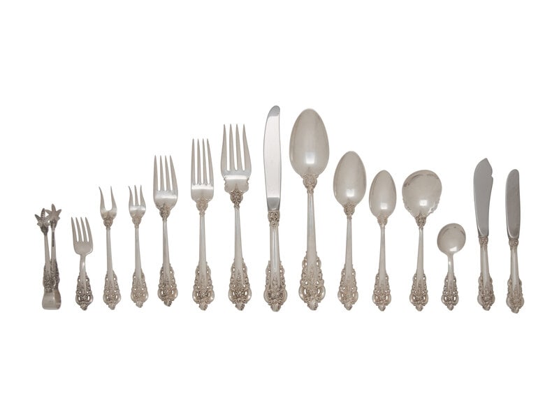 An American Silver Flatware Service: An American Silver Flatware Service Wallace Silversmiths, Wallingford, CT Grand Baroque pattern, comprising: 10 dinner knives 10 dinner forks 10 salad forks 10 place spoons 14 teas