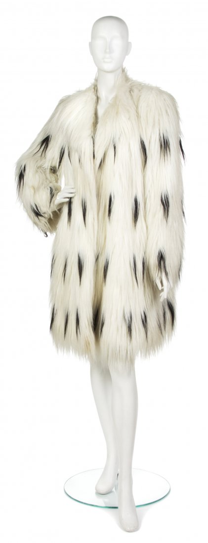 A Pauline Trigere Cream and Black Faux Fur Coat.: A Pauline Trigere Cream and Black Faux Fur Coat. Labeled: The Coat by Trigere. Property from the Personal Collection of Melanie and Philippe Radley, Son and Daughter-in-law of Pauline Trigere, North S