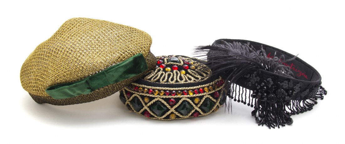 A Group of Headware,: A Group of Headware, including a Mr. John gold mesh hat, a black mesh hat likely worn in a Pauline Trigere runway show, a Pauline Trigere black sequin and feather headband and Pauline Trigere black wo