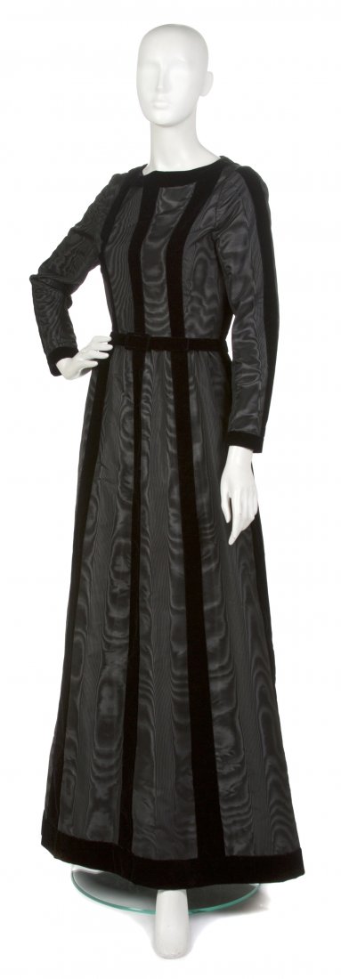 A Givenchy Couture Black Silk Faille Evening Gown,: A Givenchy Couture Black Silk Faille Evening Gown, velvet trim, vertical panels and belt. Labeled: Givenchy / 50059. Property from a New York City Collection