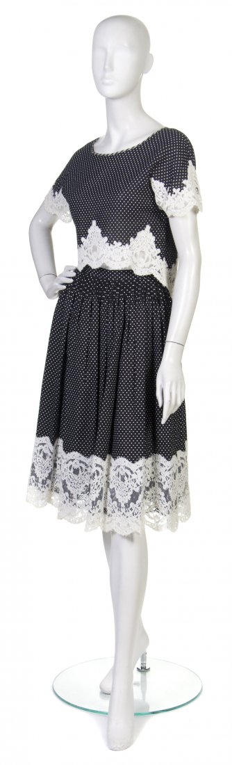 A Geoffrey Beene Couture Black and White Polka Dot: A Geoffrey Beene Couture Black and White Polka Dot and Lace Skirt Ensemble, ivory lace at sleeves, waist and bottom skirt hem. Labeled: Geoffrey Beene. Property from an Important Collector