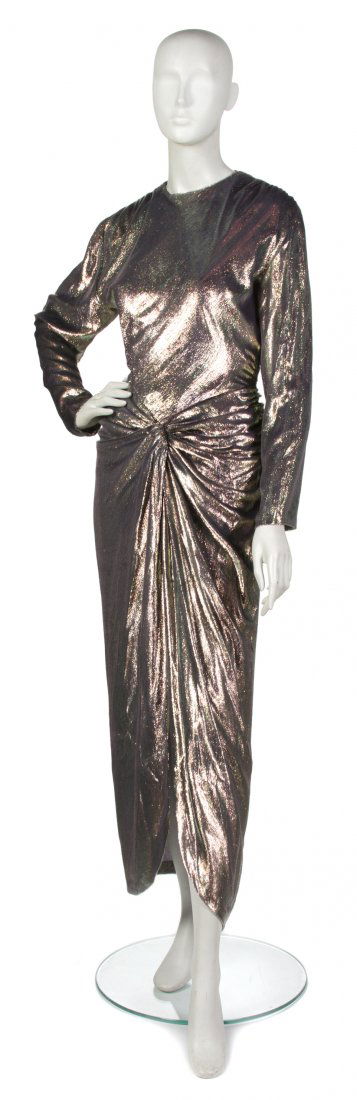 A Vicky Tiel Lame Evening Gown, Size 42.: A Vicky Tiel Lame Evening Gown, long sleeves and ruching at hips. Labeled: Vicky Tiel. Size 42. Property from an Important Collector