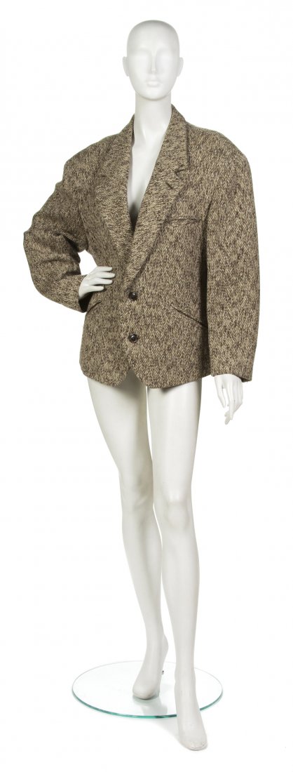 An Issey Miyake Tweed Jacket,: An Issey Miyake Tweed Jacket, olive, black and green threads, oversize shoulders. Labeled: Issey Miyake. Property from a Private Collection, Winnetka, Illinois