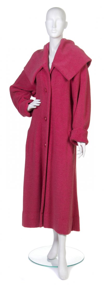 An Issey Miyake Red Coat, Size M.: An Issey Miyake Red Coat, oversized collar, red buttons down front. Labeled: Issey Miyake. Size M. Property from a Private Collection, Winnetka, Illinois