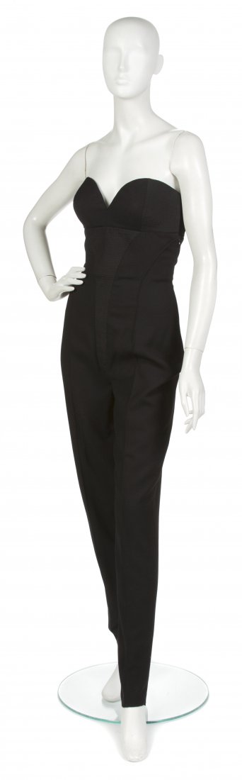 A Gianni Versace Black Wool Bustier Jumpsuit,: A Gianni Versace Black Wool Bustier Jumpsuit, 1990s, strapless with sweetheart neckline. Labeled: Gianni Versace Couture.