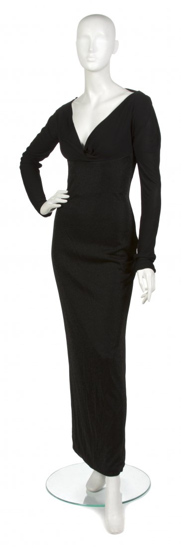 A Gianni Versace Black Lame Evening Gown, Size 10.: A Gianni Versace Black Lame Evening Gown, long sleeves, boned bodice. Labeled: Gianni Versace Couture. Size 10. Property from a New York City Collection