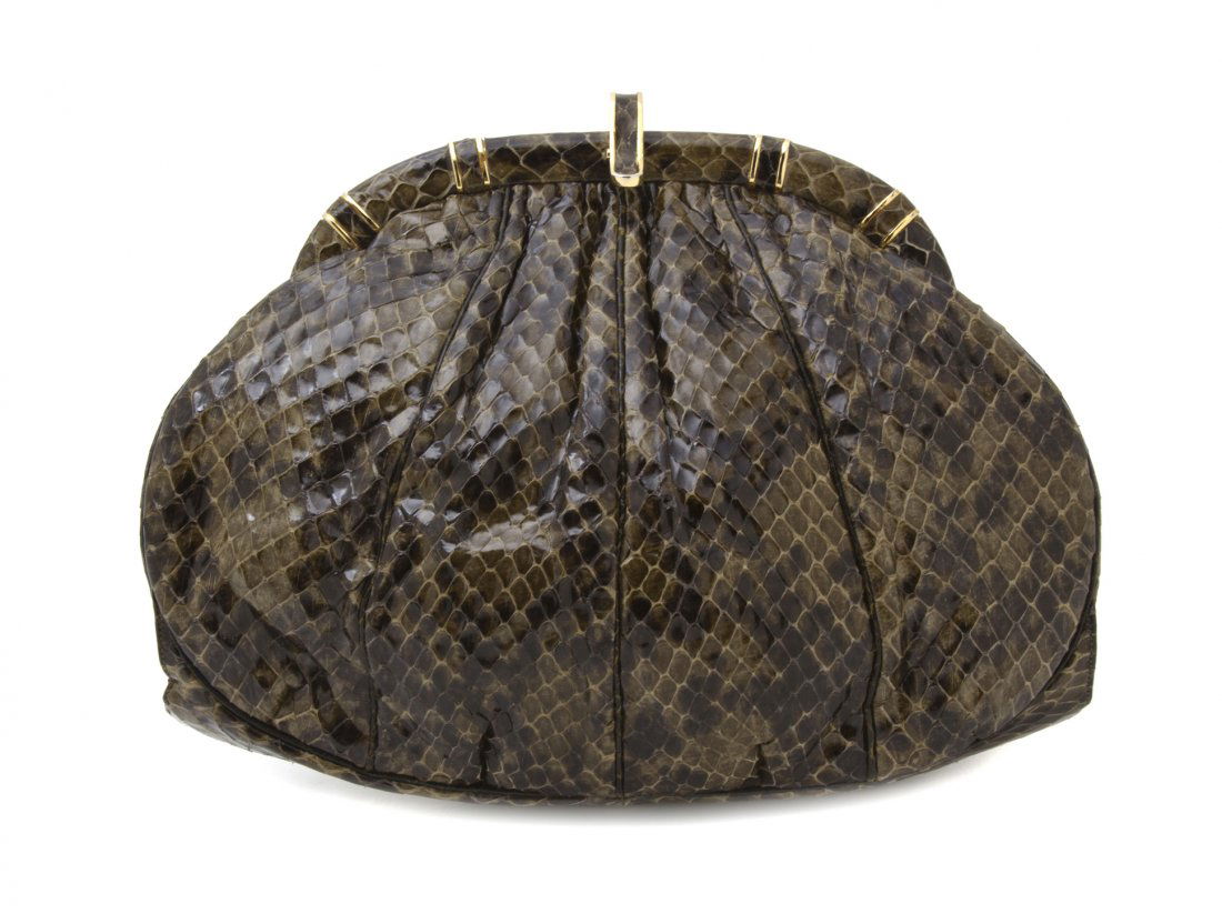 A Judith Leiber Olive Green Snakeskin Clutch, 9 x: A Judith Leiber Olive Green Snakeskin Clutch, goldtone hardware and hidden chainlink shoulder strap. Stamped: Judith Leiber. 9 x 7 x 2 inches.