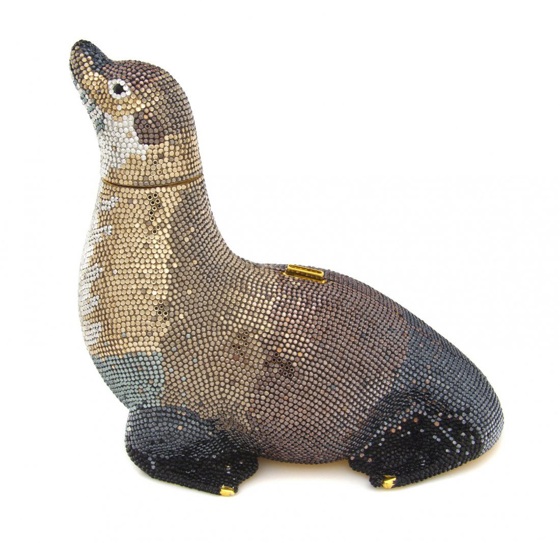 A Judith Leiber Multicolor Crystal Seal Minaudiere: A Judith Leiber Multicolor Crystal Seal Minaudiere, silver, gold, brown, gray and black crystals in an ombre design, black cabochon eyes with all accessories. Stamped: Judith Leiber